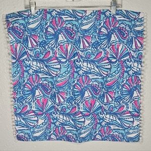Lilly Pulitzer Pink & Blue Sea Shell Print Napkin with pom poms.